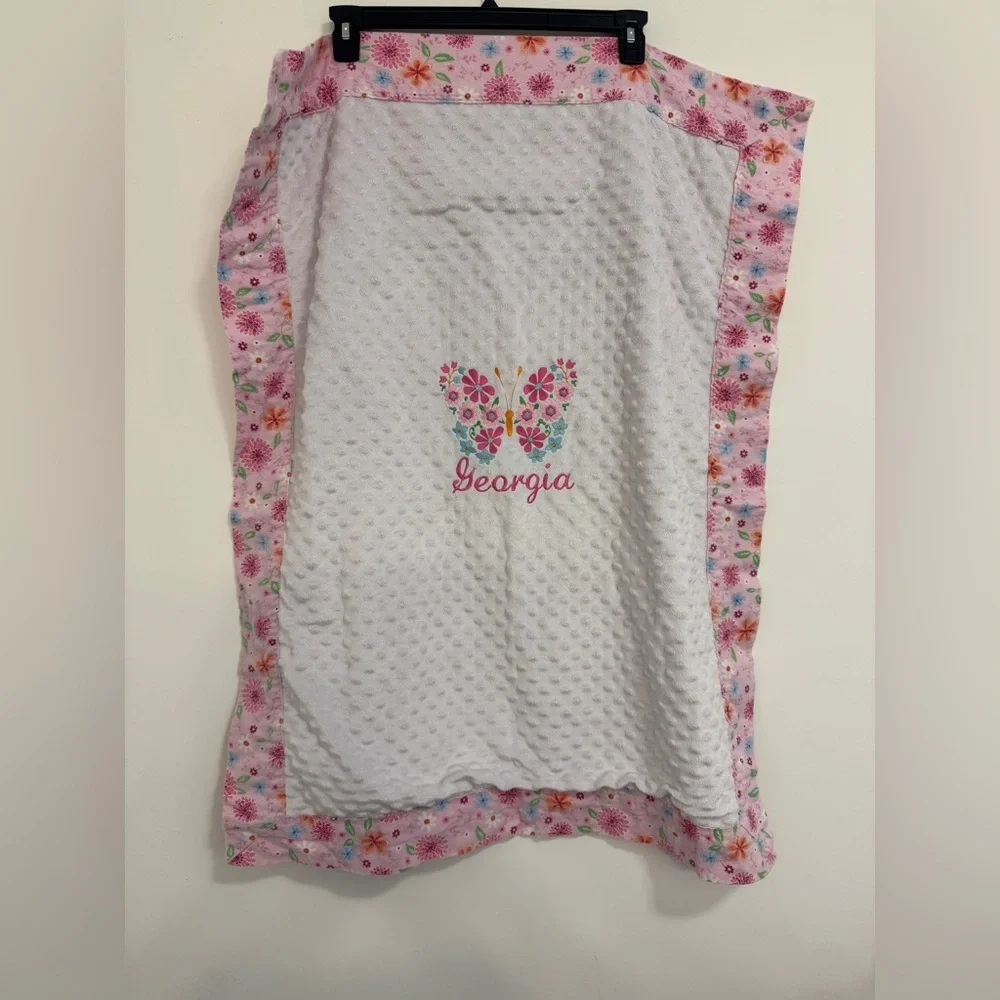 Floral Butterfly Baby Blanket with Georgia on it